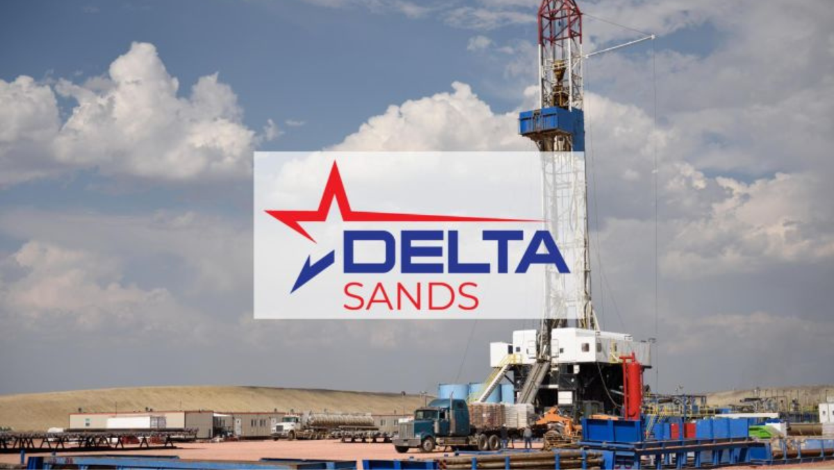Frac sand rig site with Delta Sands branding in a Texas industrial setting