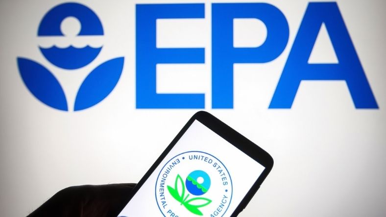EPA logo behind smartphone displaying agency seal